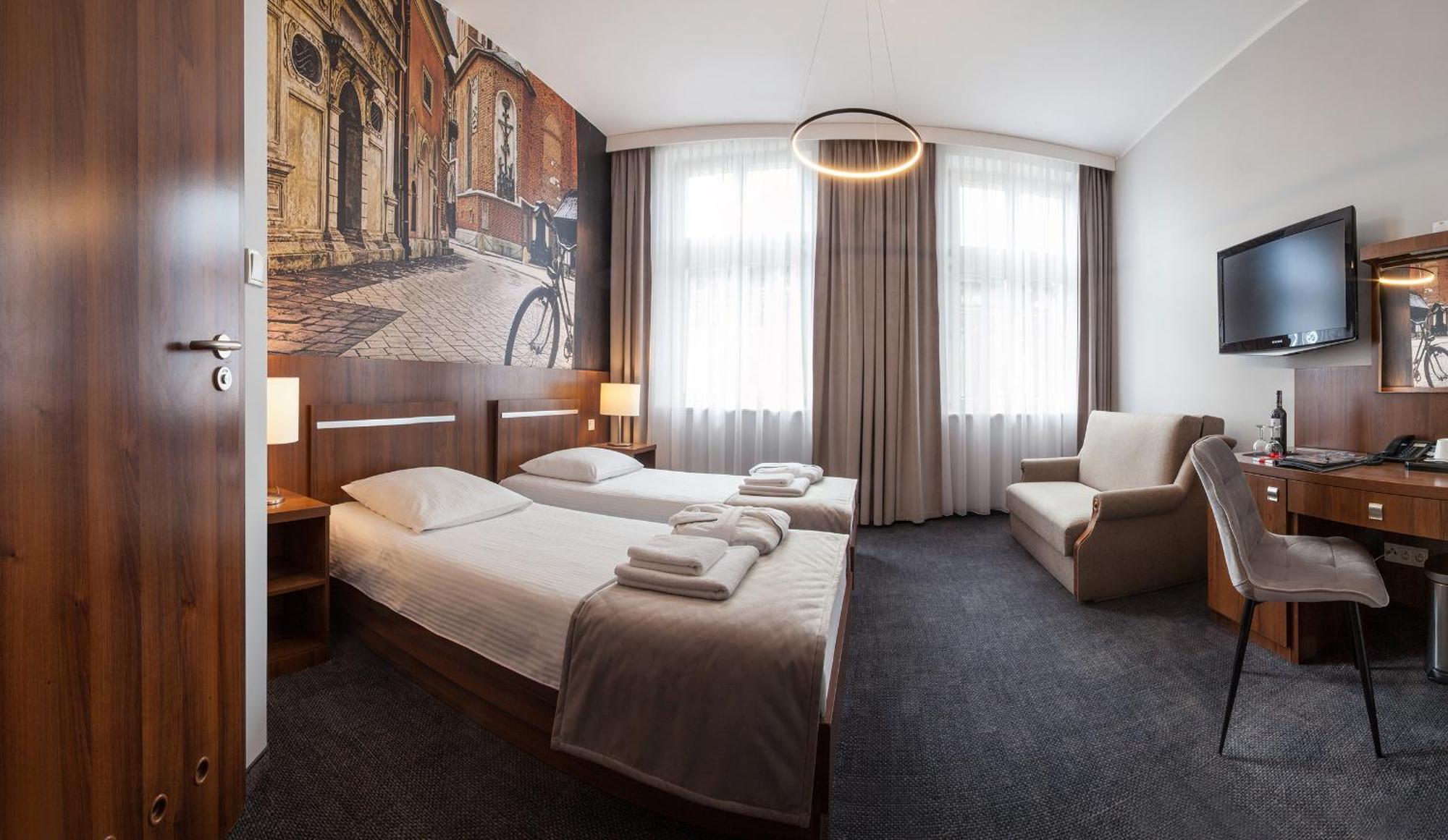 Triple Room (2 beds + folded sofa)