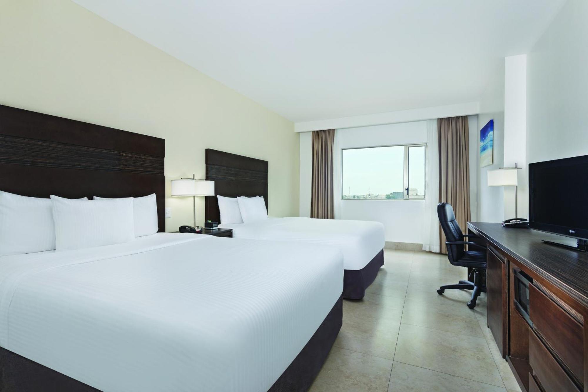Quarto Familiar Deluxe com Vista Cidade - Não Fumador