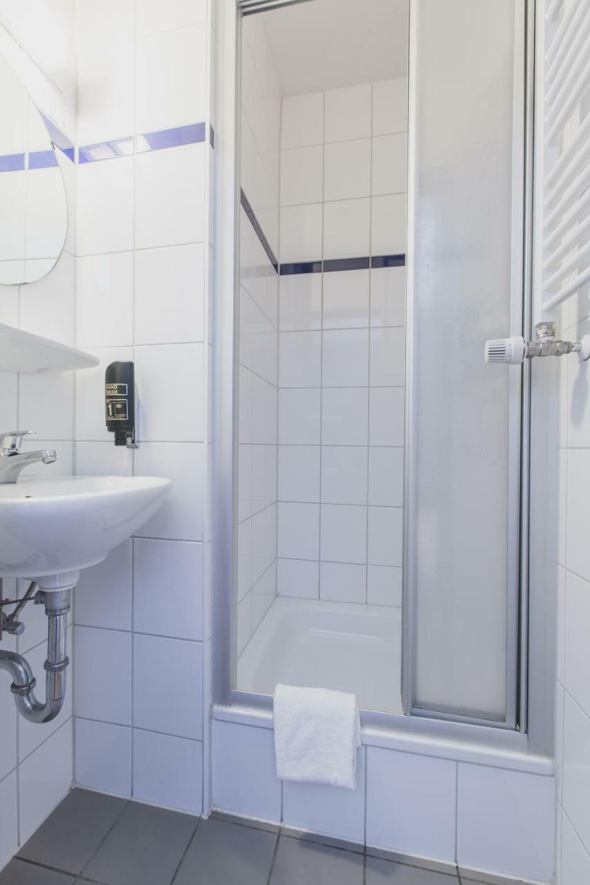 Kamer met twee aparte bedden voor eenpersoonsgebruik