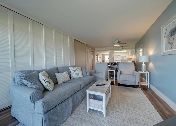 Pet Friendly hotel: On The Beach Beachfront Condo Direct View & Access To Beach Heated Pool Island House Condominiums Unit 113